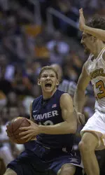 Brad Redford dropped crucial threes in the second half to help Xavier win.