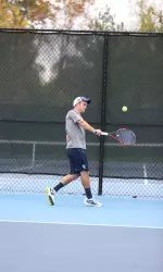 Zach Mueck improves to 5-2 on the spring season in singles.