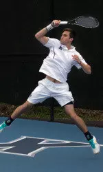 Michael Moe returns a shot back at his opponent.