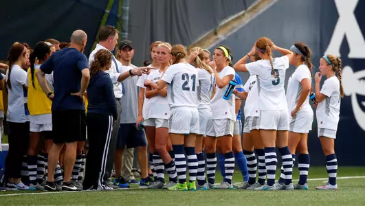 Head coach Woody Sherwood gives the team some instructions