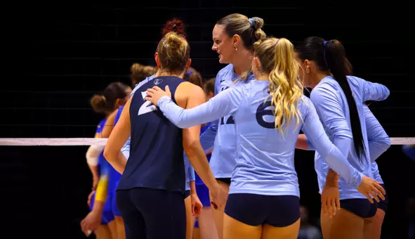 volleyball team huddle