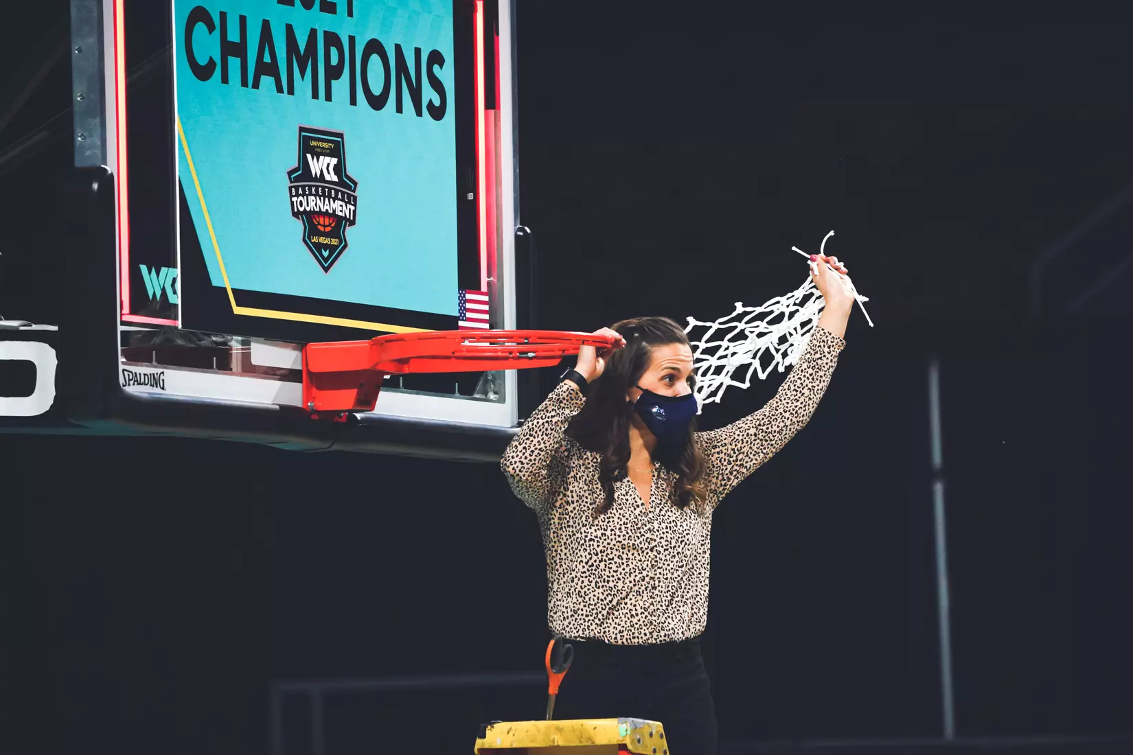 Mar 9, 2021; Las Vegas, NV, USA; Gonzaga Bulldogs head coach Lisa Fortier poses with the net after the West Coast Conference Tournament championship against the BYU Cougars at Orleans Arena. Gonzaga defeated BYU 43-42. Mandatory Credit: Kirby Lee-USA TODAY Sports