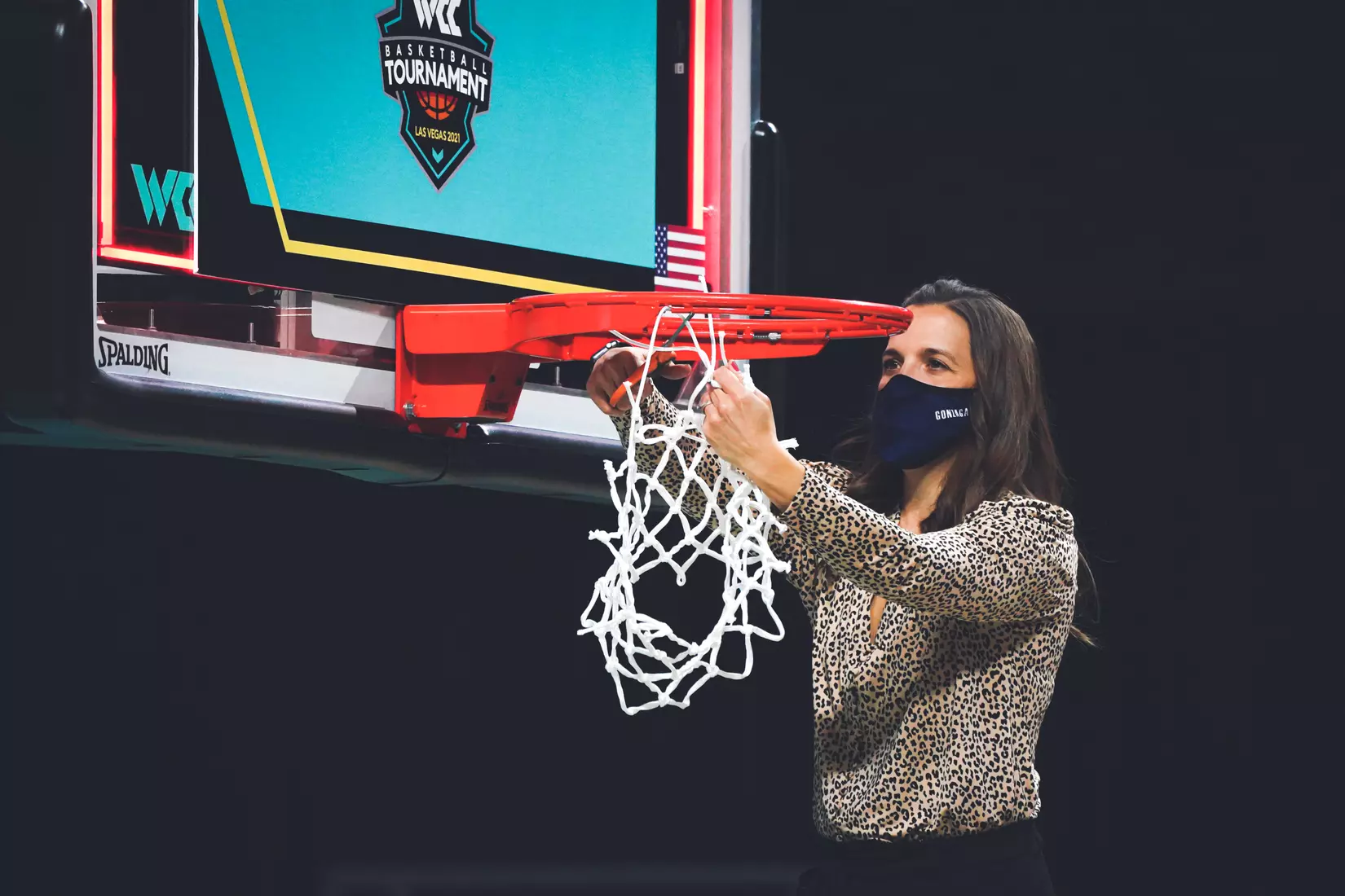 Mar 9, 2021; Las Vegas, NV, USA; Gonzaga Bulldogs head coach Lisa Fortier cuts down the net after the West Coast Conference Tournament championship against the BYU Cougars at Orleans Arena. Gonzaga defeated BYU 43-42. Mandatory Credit: Kirby Lee-USA TODAY Sports