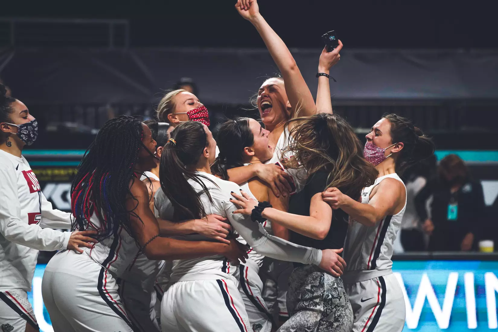 Mar 9, 2021; Las Vegas, NV, USA; Gonzaga Bulldogs guard Jill Townsend (32) celebrates with teammates after scoring the game-winning basket as time expired in the West Coast Conference Tournament championship against the BYU Cougars at Orleans Arena. Mandatory Credit: Kirby Lee-USA TODAY Sports