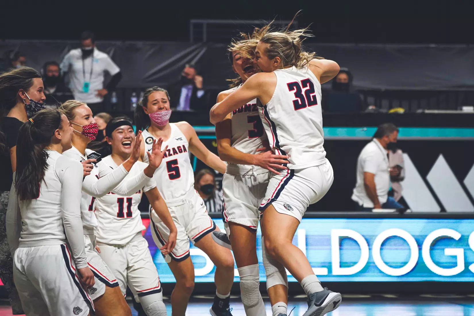 Mar 9, 2021; Las Vegas, NV, USA; Gonzaga Bulldogs guard Jill Townsend (32) celebrates with teammates after scoring the game-winning basket as time expired in the West Coast Conference Tournament championship against the BYU Cougars at Orleans Arena. Mandatory Credit: Kirby Lee-USA TODAY Sports