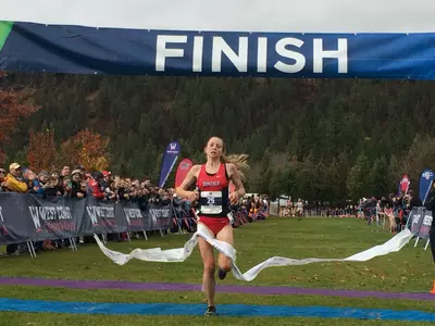 Shelby Mills crosses the line