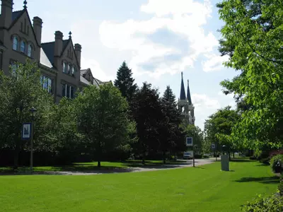 Campus photo of ad building and spire