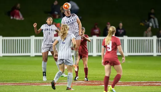 Lexi Clark goes up for a header