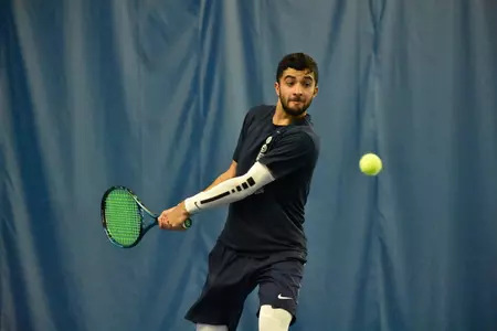 Sam Feit returns serve vs. Santa Clara (Photos by Nick Tomoyasu