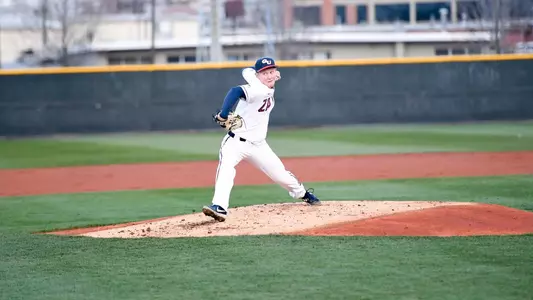 Mason Wells delivers a pitch