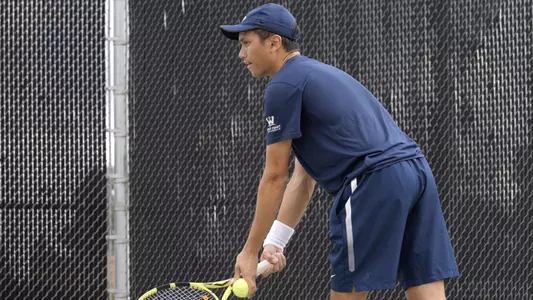 Vincent Rettke readies to serve