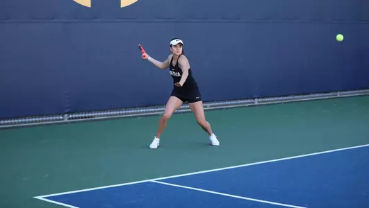 Vlada Medvedcova hits a forehand