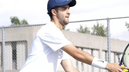 Sam Feit readies for a serve