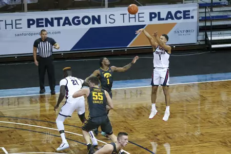 Gonzaga guard Jalen Suggs (1) shoot a 3-pointer during the first half of an NCAA college basketball game against Iowa, Saturday, Dec. 19, 2020 in SIoux Falls, S.D. (AP Photo/Josh Jurgens)