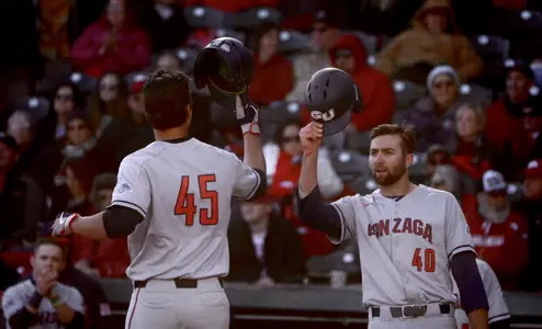 Gabriel Hughes celebrates his home run