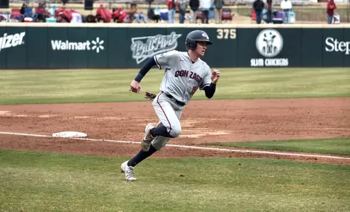 Ernie Yake scores a run