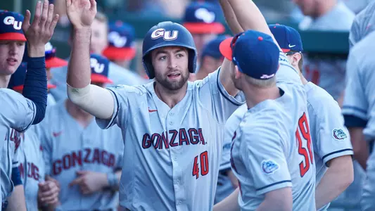 Ryan Sullivan high-fives teammates