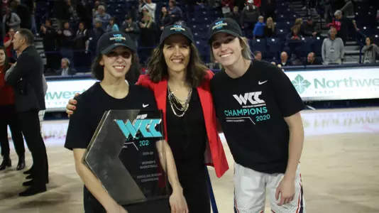 Jessie Loera Lisa Fortier Katie Campbell celebrate with the WCC Trophy