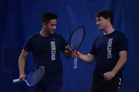 Bryan Husin and Matthew Perkins celebrate a doubles point