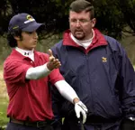 Junior Andrew Gallo confers with coach Scott Allen last season.