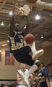 Pops Mensa-Bonsu dunks during the first half of the game against St. Bonaventure in Olean, N.Y