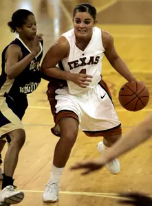 Kimberly Beck, left, defends against Texas guard Erika Arriaran on Saturday (AP Photo)