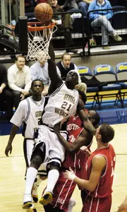 Pops Mensah-Bonsu (21) goes to the basket against Boston University on Friday.(AP Photo)