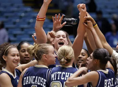 Anna Montañana celebrates with her teammates the 60-57 victory over Mississippi in the first round of the Women's NCAA tournament. (AP Photo/Gerry Broome)