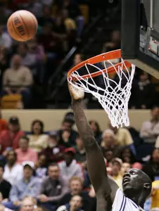 Pops Mensah-Bonsu scored 17 points and grabbed 12 boards against Rhode Island. (File Photo)