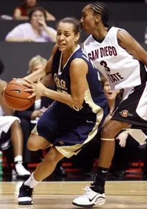 Sarah-Jo Lawrence drives to the hoop in George Washington's 76-42 rout of San Diego State. (AP Photo/Denis Poroy)