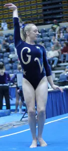 Senior Erin Aiken posted a score of 9.8 to share top honors in the floor exercise on Sunday, Feb. 12, versus Kent State at Smith Center.