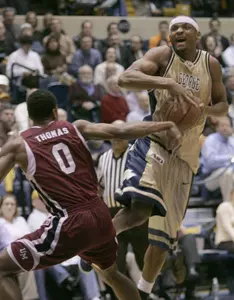Mike Hall struggles to take control of the ball during the first half.
