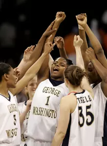 The team celebrates a 87-72 win over Old Dominion in the first round. (AP Photo/Stephan Savoia)