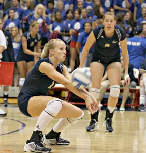 Janine Brown's 17 digs and 16 kills led the Colonials at Xavier Saturday night.