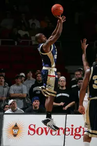 Noel Wilmore's 12 points helped GW avoid a preseason upset Wednesday at Smith Center.