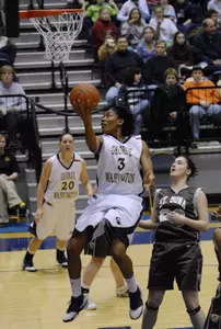 Whitney Allen goes to the basket past St. Bonaventure's Maripier Malo during the first half Sunday. (AP Photo/Nick Wass)