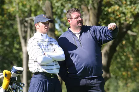 GW coach Scott Allen (right) and junior Tim Johnson aim to defeat 22 other entries in this year's GW Invitational at Bear Trap Dunes.