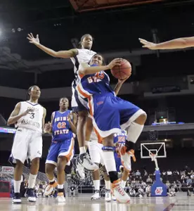 Junior Kimberly Beck, seen here rejecting Boise State's Tasha Harris, was named one of the three finalists for the Nancy Lieberman Award on Friday.