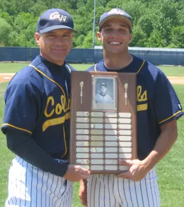 GW Baseball Head Coach Steve Mrowka presents Mickey Shupin with the Fulton Memorial Award