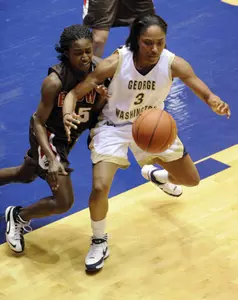 Whitney Allen (3) goes after a loose ball against Brown's Courtney Lee (15).