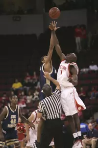 Rob Diggs and the Colonials tip off the season at Boston University for the second time in the last three seasons Friday night.