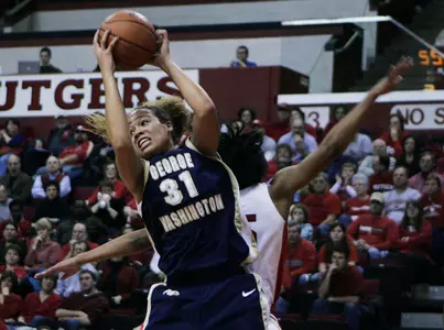 Tara Booker grabs a rebound during the first half of George Washington's 57-47 loss to No. 15 Rutgers.