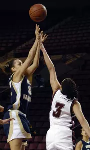 Sarah-Jo Lawrence hits a jumper over Massachusetts' Sakera Young during the first half.