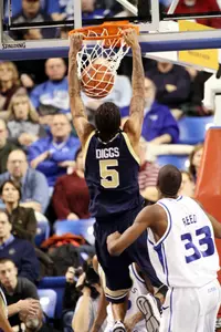 Rob Diggs leads the Colonials against Dayton Thursday at Smith Center.