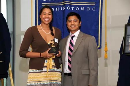 Leah Hill accepts the 2008 MVP award from coach Jojit Coronel May 4.