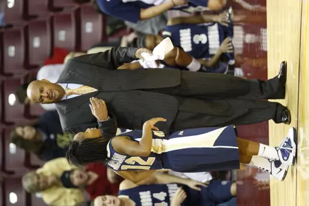 Head coach Mike Bozeman and sophomore guard Danni Jackson take the floor at Charles E. Smith Center for the first time this season Thursday night against Coppin State.