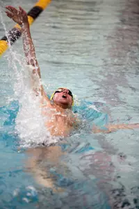 Alex Etz swam in the 100-yard freestyle and 400-yard freestyle relay for the Colonials Sunday.