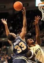 Daymon Warren goes up for a rebound against UAB Monday night.