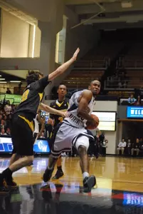 Dwayne Smith scored his season-high 18 points in leading GW past Towson Wednesday night at Smith Center.
