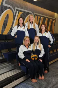 GW women's water polo seniors (standing, l-r) Marissa Stamler, Tara Sullivan, Sarah Fitch, (seated, l-r) Emily Chereson and Bernadette Karandy lead the team to its 2010 season opener against Villanova Friday.